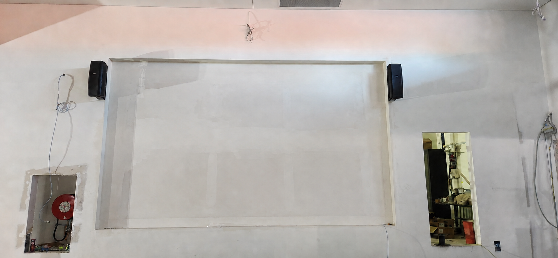 The sports bar screen location prepared and ready, immediately before the LED wall installation began.
